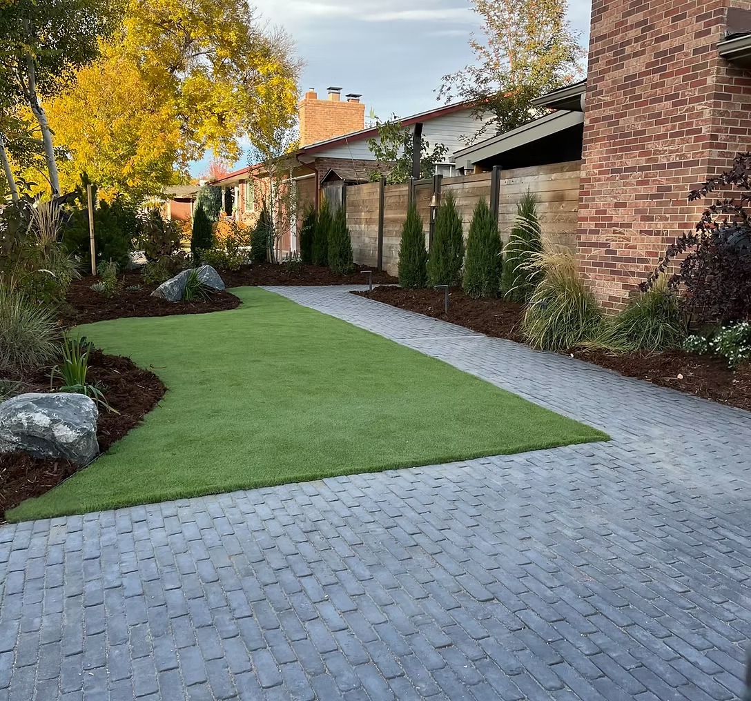Artificial turf and pavers