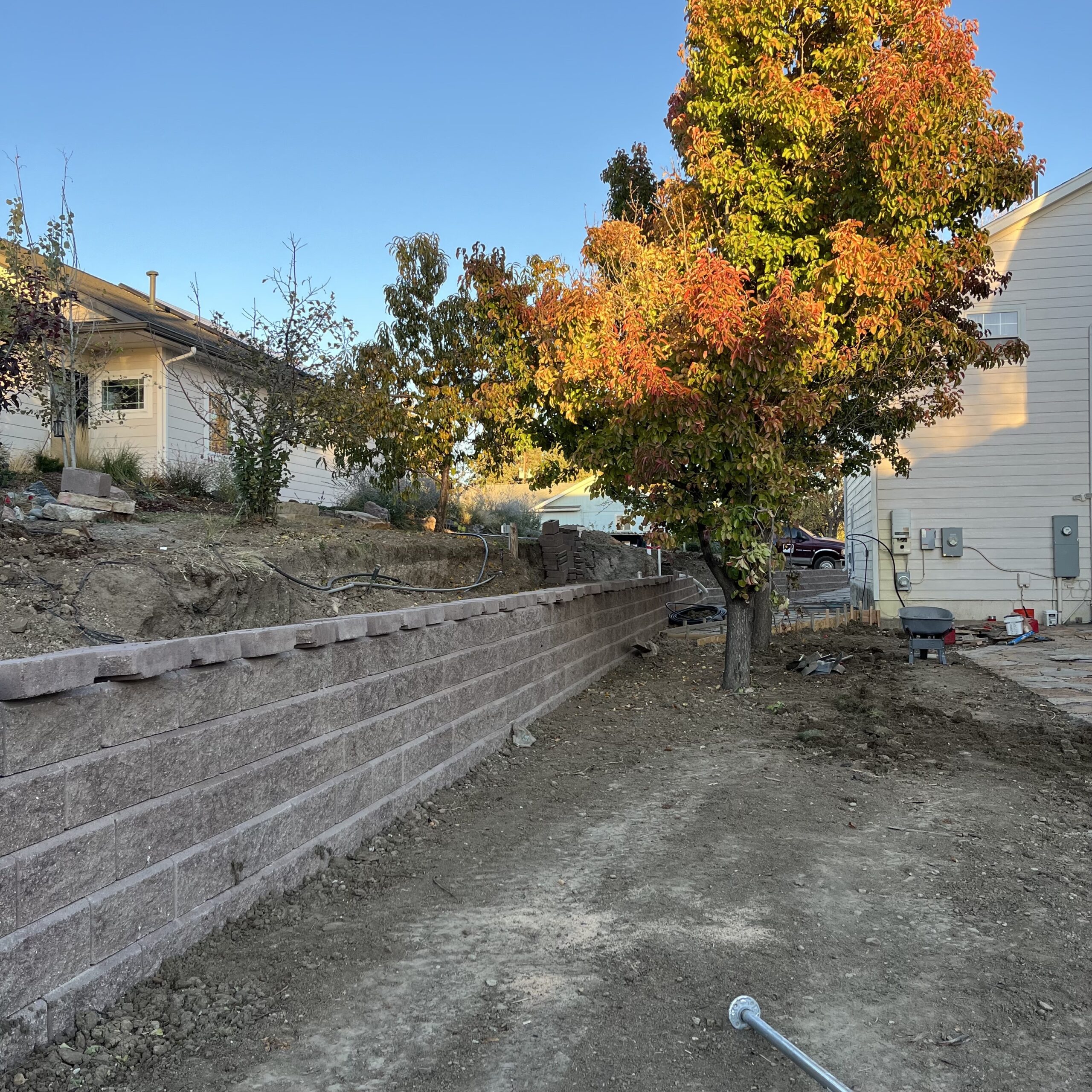 Boulder timber retaining wall after
