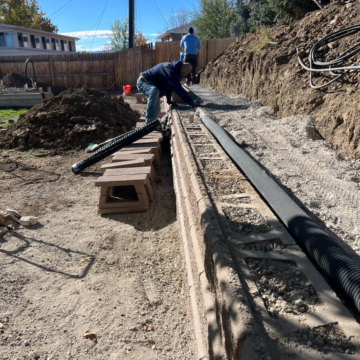 Boulder timber retaining wall during