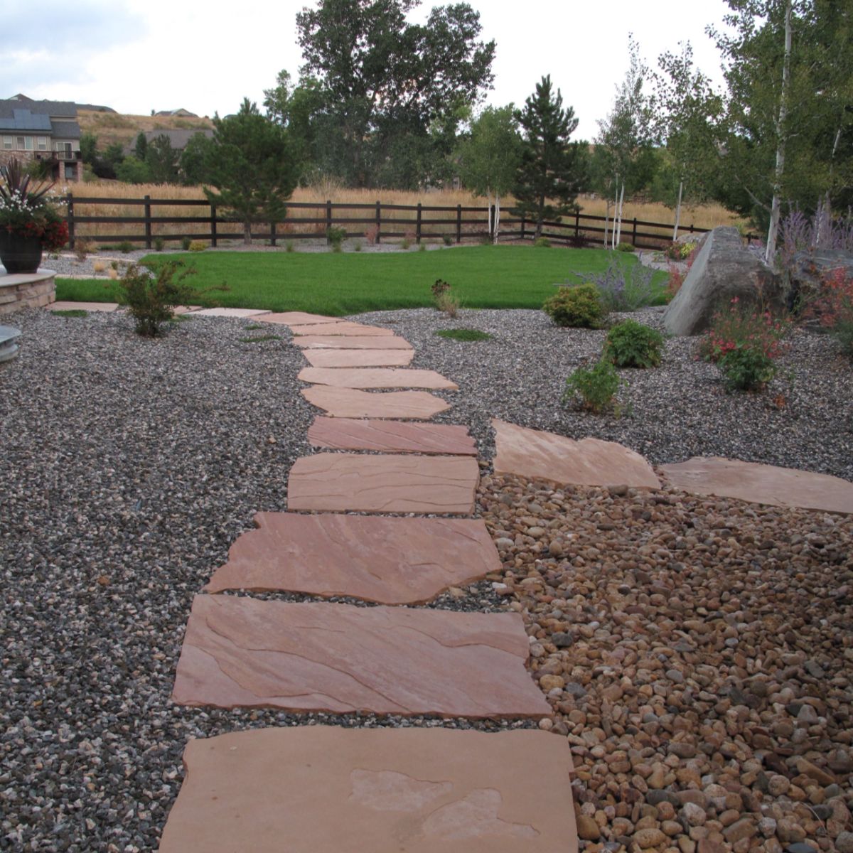 Native planting beds and gravel pathway — Front Range, Colorado