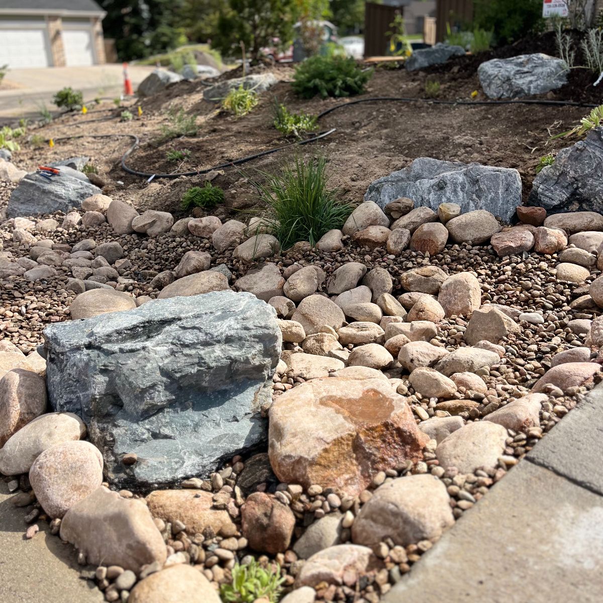 Regrading and drainage work during the front yard transformation