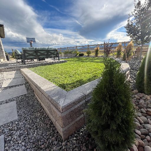 Landscape design with new sod and raised beds