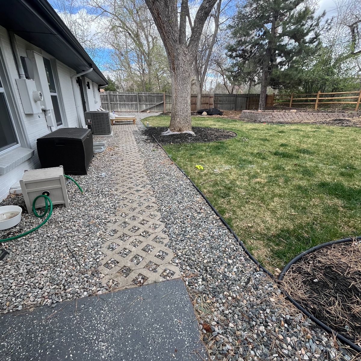 Backyard before paver patio and sod installation in Littleton CO