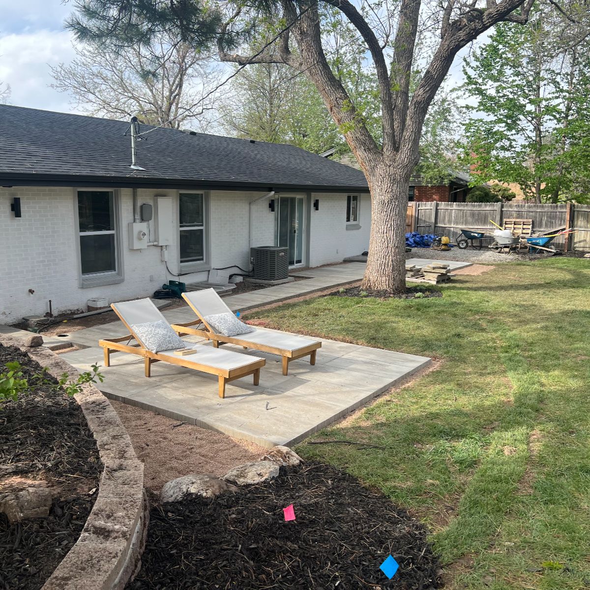 New paver patio with fresh sod in Littleton CO