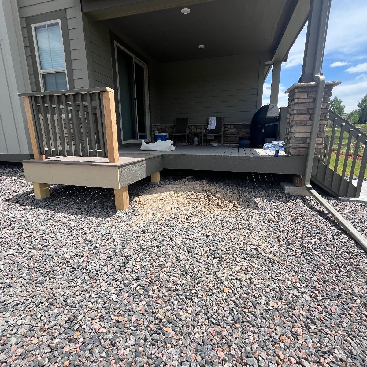 Yard before hot tub pad and drainage installation in Arvada CO