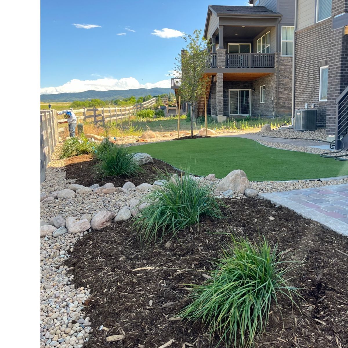 Artificial turf and paver patio