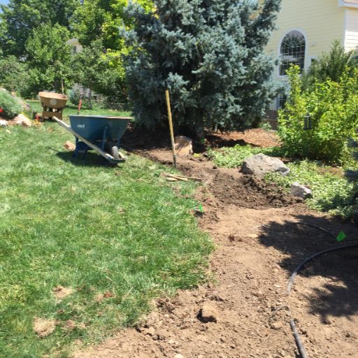 Custom water feature under construction in an Arvada, Colorado backyard
