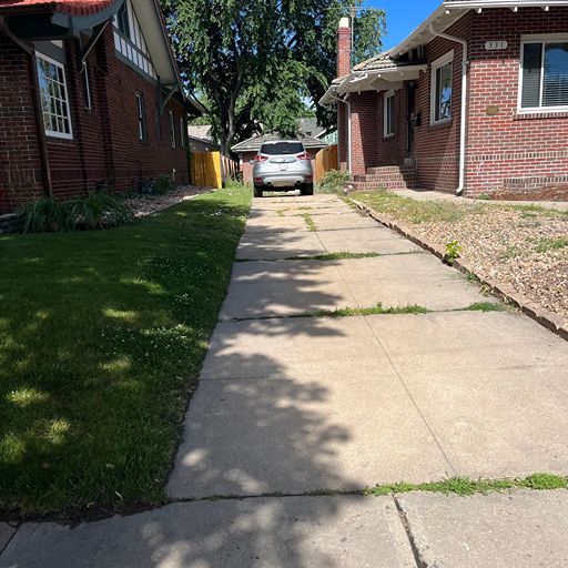 Entry and yard before demolition — Denver, Colorado